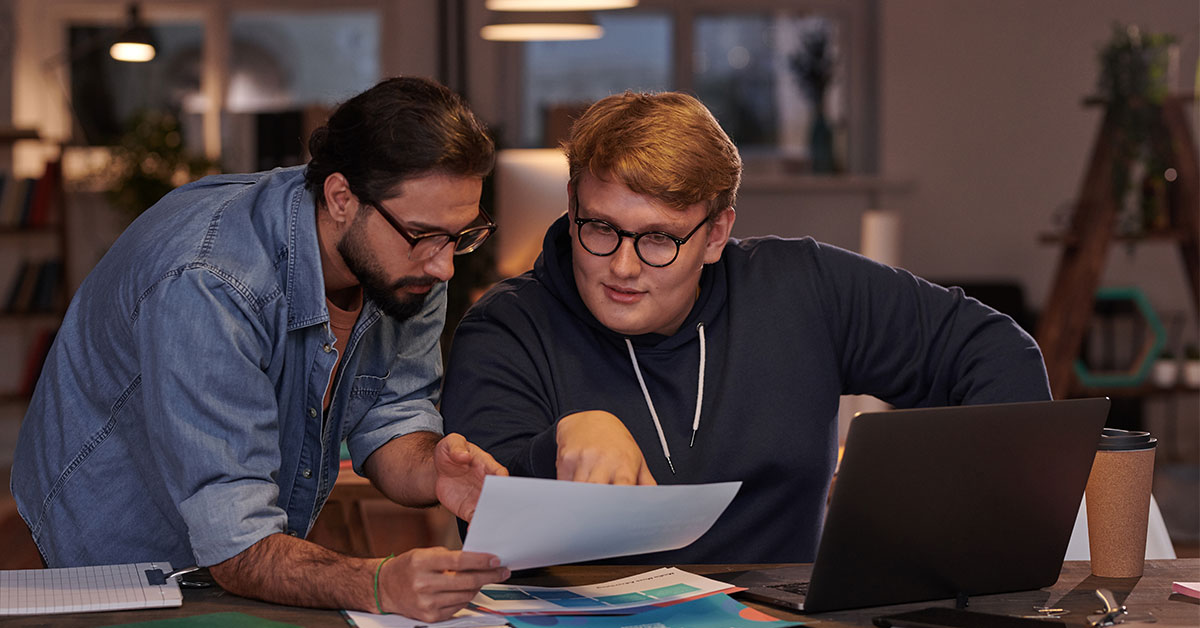 two men working on a project together