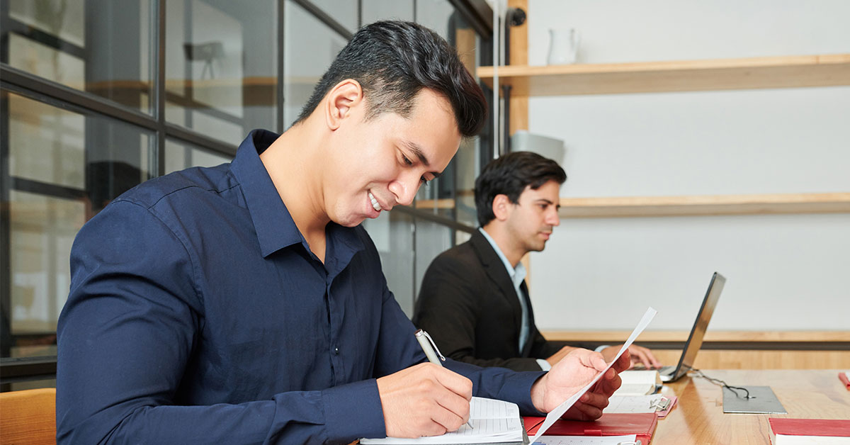 two men working at a desk